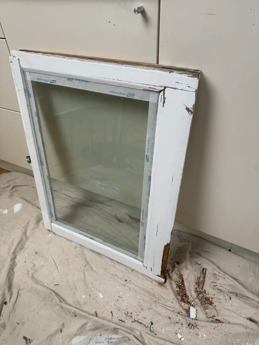 Sash removed from frame ready for stripping and repainting in the workshop