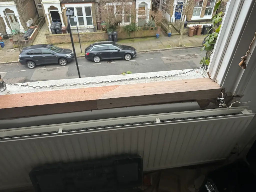 Window sill after restoration and repainting