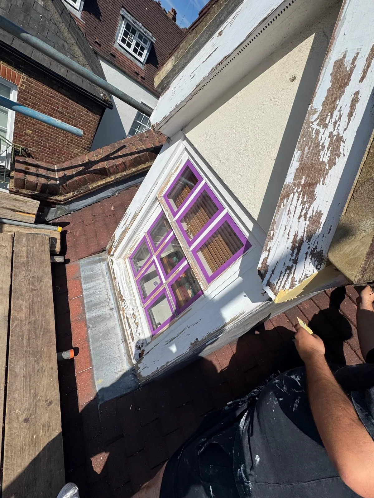 Stucco front exterior restoration on an Islington townhouse — photo 1